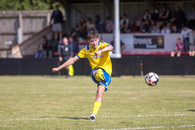 Alex Barsa scores Gosport's seventh goal direct from a free-kick at former club Petersfield. Picture by Tom Phillips