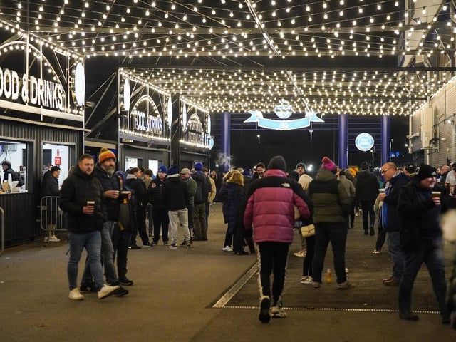 Pompey fans backed their team to a crucial Championship survival win over Cardiff last night.