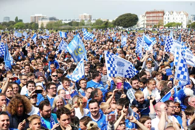 Pompey supporters celebrate on Southsea Common after the unveiling of League Two winners Pompey in May 2017. Picture: Joe Pepler