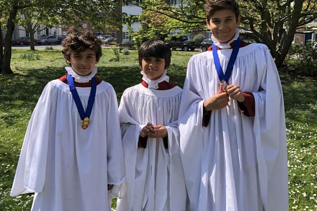 Pictured left to right are George Cuthbert, aged 12 and his brothers David, 10, and James, 14, performed a hymn from their home in Southsea during a live broadcast of Portsmouth's Easter service