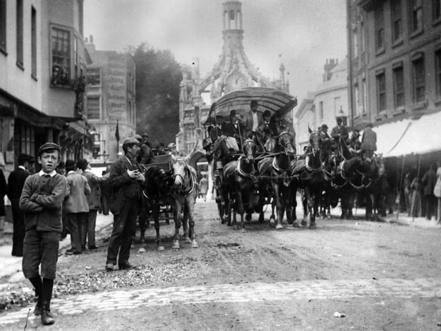 Stage coaches off to Goodwood from Chichester. (Photo by F J Mortimer/Hulton Archive/Getty Images)