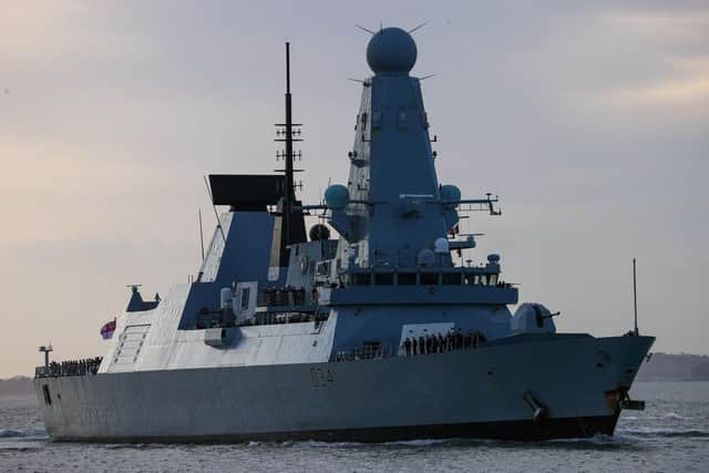 HMS Diamond arriving back into their home port of Portsmouth on Thursday morning after 7 months at sea, as families gather in the dockyard to welcome back their loved ones. Photos by Alex Shute.