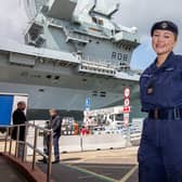 Helayna Birkett in front of HMS Queen Elizabeth before she sets sail as part of the Carrier Strike Group.

Picture: Habibur Rahman