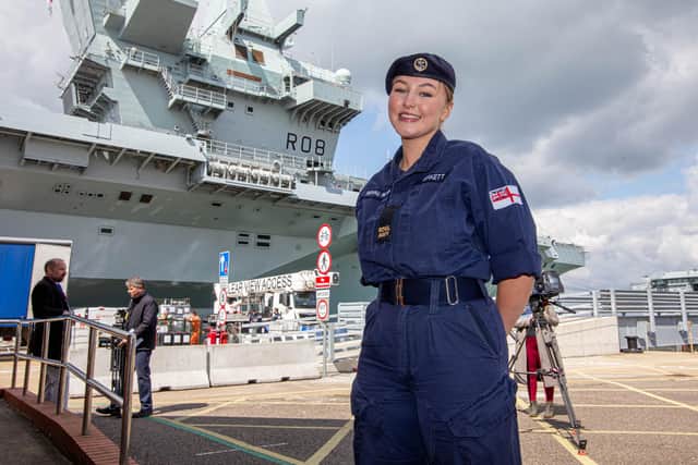 Helayna Birkett in front of HMS Queen Elizabeth before she sets sail as part of the Carrier Strike Group.
Picture: Habibur Rahman
