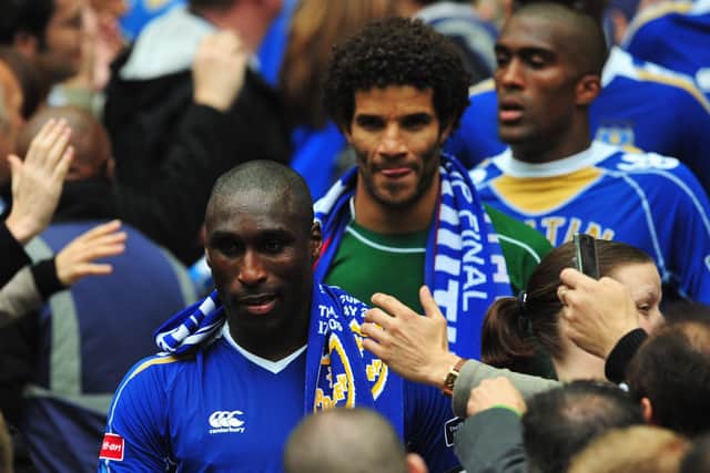 Sol Campbell, front, and David James walking down the steps at Wembley following Pompey's 2008 FA Cup success.  Picture: Shaun Botterill/Getty Images