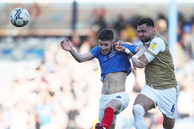 George Hirst is held up by Wycombe defender Ryan Tafazolli during the controversial second-half moment. Picture: Joe Pepler