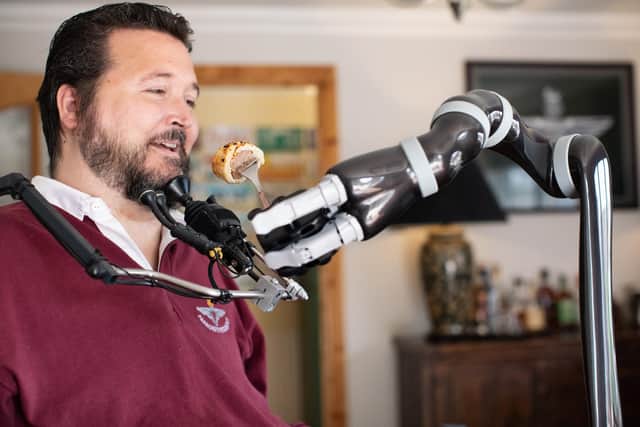 Veteran with spinal cord injury first to receive assistive robotic arm
Military veteran Jon Noble from Havant, Hampshire has recently been able to feed himself for the first time in 17 years after receiving a robotic arm thanks to charity funding. Jon has become the first person with a spinal cord injury in the UK to receive a JACO assistive robotic arm.