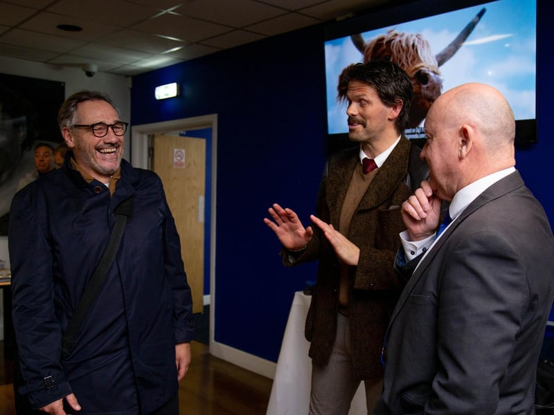 Hermann Hreidarsson and Guy Whittingham sharing a joke in the Victory Lounge.