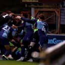 HIGH WYCOMBE, ENGLAND - JULY 06: Wycombe Wanderers celebrate after the Sky Bet League One Play Off Semi-final 2nd Leg match between Wycombe Wanderers and Fleetwood Town at Adams Park on July 06, 2020 in High Wycombe, England. Football Stadiums around Europe remain empty due to the Coronavirus Pandemic as Government social distancing laws prohibit fans inside venues resulting in all fixtures being played behind closed doors. (Photo by Warren Little/Getty Images)