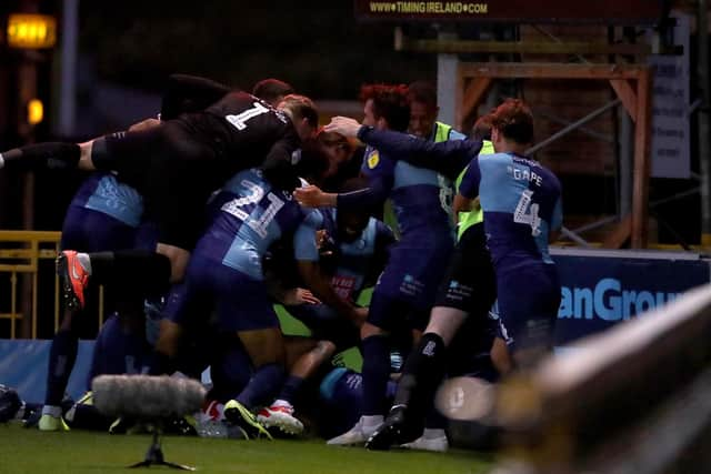 HIGH WYCOMBE, ENGLAND - JULY 06: Wycombe Wanderers celebrate after the Sky Bet League One Play Off Semi-final 2nd Leg match between Wycombe Wanderers and Fleetwood Town at Adams Park on July 06, 2020 in High Wycombe, England. Football Stadiums around Europe remain empty due to the Coronavirus Pandemic as Government social distancing laws prohibit fans inside venues resulting in all fixtures being played behind closed doors. (Photo by Warren Little/Getty Images)