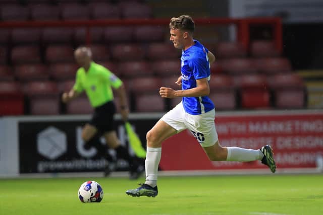 Harry Jewitt-White, seen here in action against Leyton Orient, would net his first Pompey goal at Bognor on Wednesday night. Picture: Simon Roe/ProSportsImages