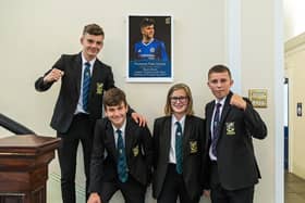 Ben Saunders, Harvey Bates, Alice Jacknelle and Albert-Lee Garrett (all 14) show a gesture of support for Mason Mount, a former pupil at Purbrook Park School. Picture: Mike Cooter (090721)