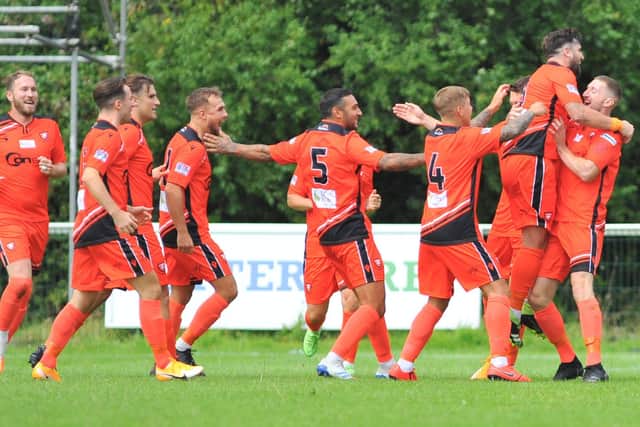 Lee Wort, right, has just given AFC Portchester an early lead. Picture: Martyn White.
