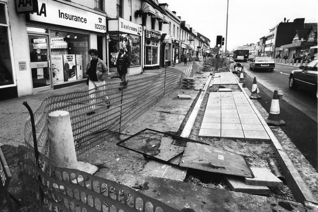 Paving work is carried out in West Street in Fareham in December 1990