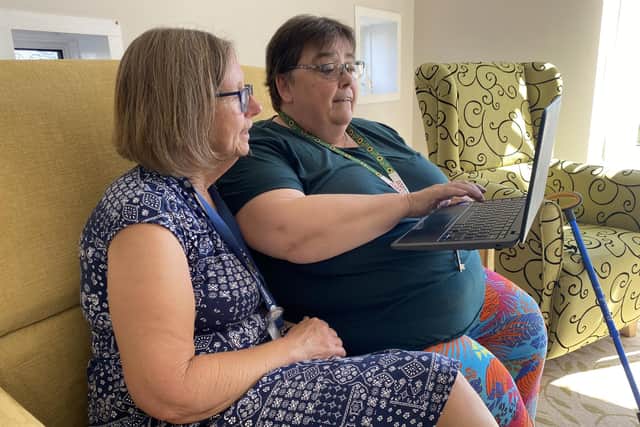Digital trainer Karen Loneragan, left, with resident Mary Bridle at Alec Rose House, Gosport