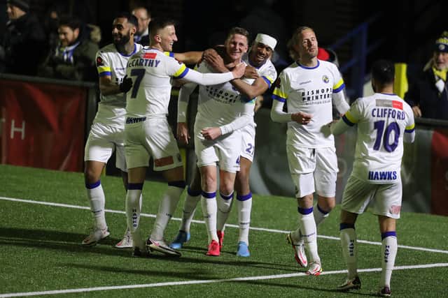 Joe Oastler (middle) celebrates his second goal against Hungerford. Picture by Dave Haines.
