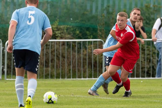 Liam Kimber, seen here in Wessex League action for Horndean (red), netted for AFC Southdown in their Portsmouth Sunday League victory over Purbrook. Picture: Keith Woodland