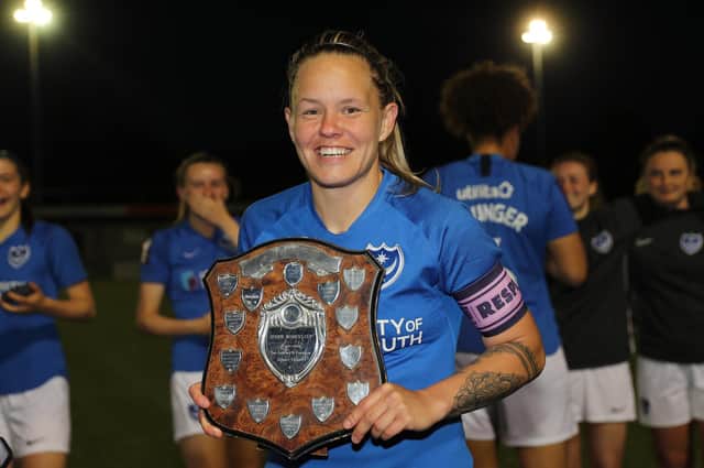 Captain for the night Katie James signed off from Pompey Women by winning the PDFA Women's Cup trophy. Picture: Dave Haines
