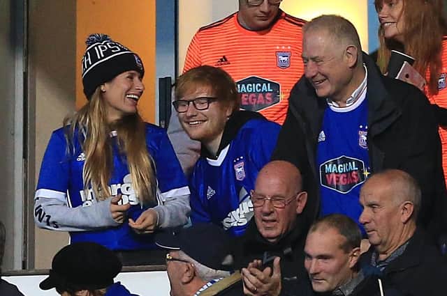 Ipswich Town fan and singer Ed Sheeran, centre. Picture: Stephen Pond/Getty Images