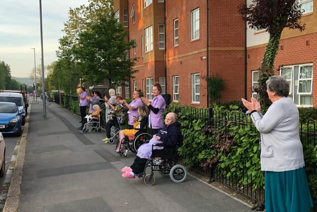 Residents of sheltered accommodation block Maritime House, in Northern Parade, Hilsea, join the Clap for Carers applause.