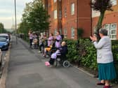 Residents of sheltered accommodation block Maritime House, in Northern Parade, Hilsea, join the Clap for Carers applause.