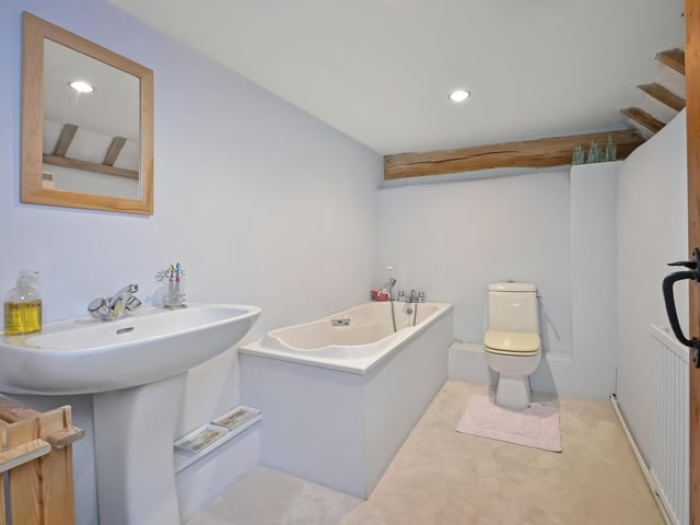 Springhead Barn is around 210 years old, but has become a comfortable modern home. Picture: Fine and Country