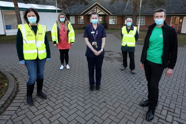 Ann Evans, Demi Lawrence, Megan Sankey, Bob Hayter, and Jonathan Phillips at the St James's Hospital vaccine hub. Picture: Sam Stephenson