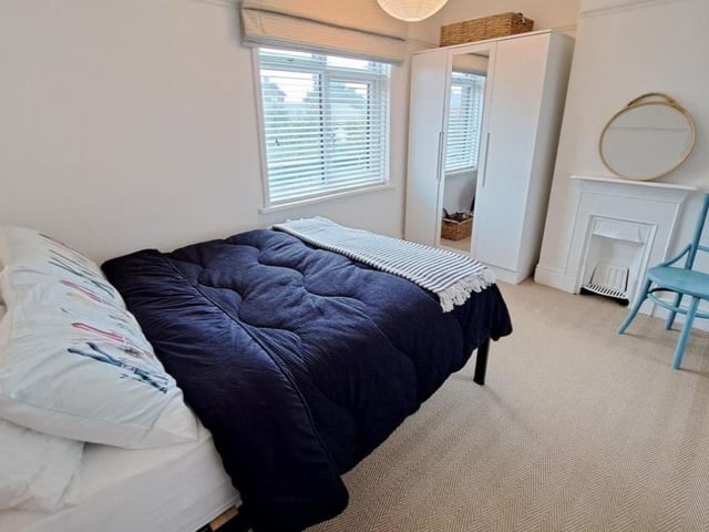 The listing says: "The property is beautifully presented throughout with the internal accommodation briefly comprising of - entrance porch, hallway, living room with log burner, family room opening into a wonderful modern fitted kitchen/diner with bi fold doors leading to garden, utility room, two beautiful shower rooms and three bedrooms."