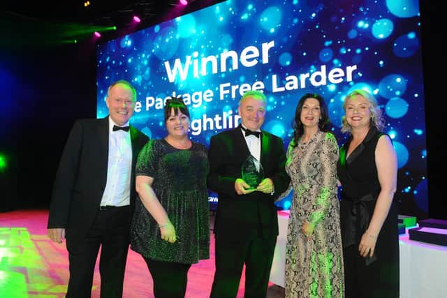 Professor Jeremy Howells, far left,  from the University of Portsmouth, at last year's The News Business Excellence Awards presenting the Sustainable Business of the Year Award to Sam Woodman, David Williams, Kirstie Higgins-Day, and Sara Howden from Wightlink.

Picture: Sarah Standing