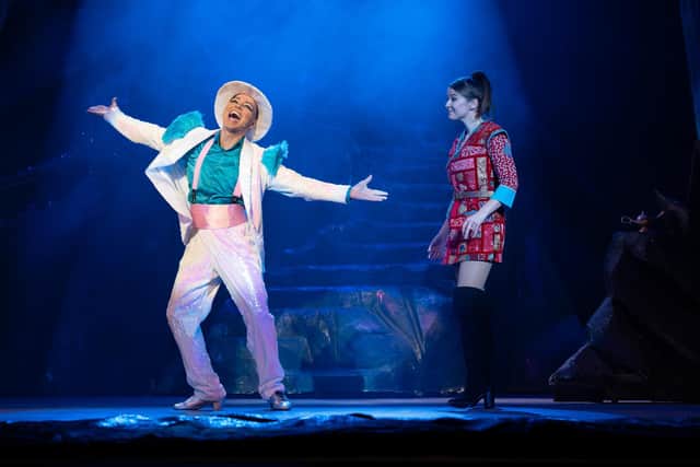 Miguel Angel is the Genie of the Lamp, with Emma Marsh as Aladdin.