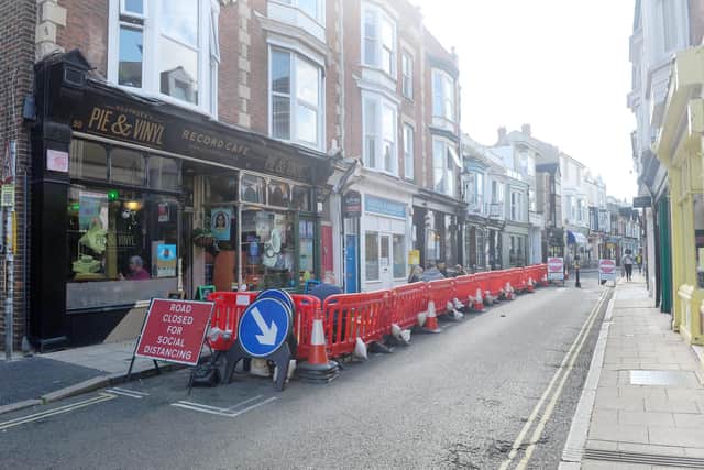A section of Castle Road in Southsea, has been pedestrianised to allow for social distancing. Many traders are happy with the atmosphere this has created and believe it is a safer, better shopping experience for customers as a result.

Picture: Sarah Standing (011020-4814)