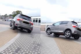Toyota parks on top of bollard outside Fareham train station.