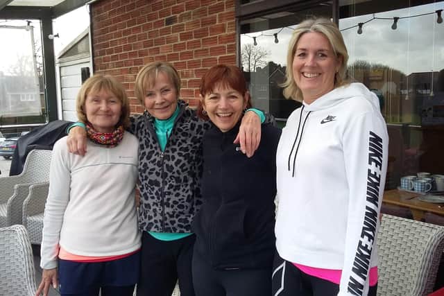 From left to right: Angie Brown, Jeanette Bush, Lynne Foster and Nicky Baker sheltering from the bad weather while the other four played on in Avenue's midweek ladies meeting with Rowlands Castle:
