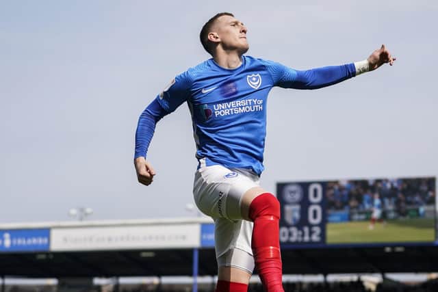 Ronan Curtis celebrates his opening goal in Pompey's 3-1 win against Gillingham at Fratton Park     Picture: Jason Brown