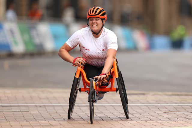 Eden Rainbow-Cooper of Team England celebrates finishing second in the Women's T53/54 Marathon. Picture by Mark Kolbe/Getty Images