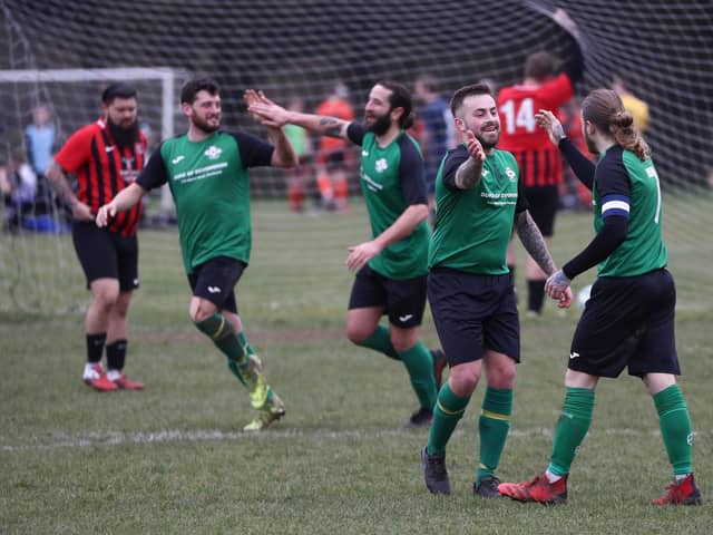 Saturn Royale celebrate one of their four goals. Picture: Stuart Martin