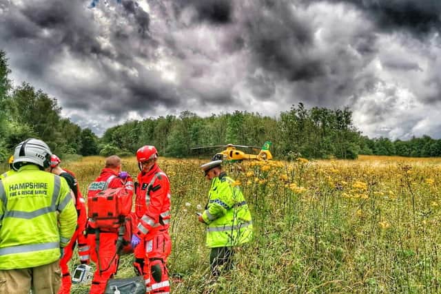 Gwen Rickman from Havant was involved in a car crash on the M3.
Pictured: The air ambulance team coming to her aid
Picture: Hampshire and Isle of Wight Air Ambulance