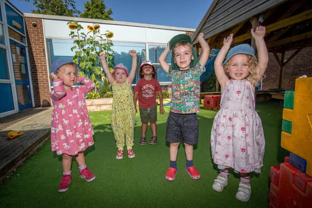 7 September 2021
Mill Hill Nursey in Waterlooville has scooped the Best Little Seedlings prize for its project, Growing Places
Pictured: Oli 3, Flo 3, James 3, Ziggy 4 and Georgie 4 in the play area where they have been growing their plants
Picture: Habibur Rahman