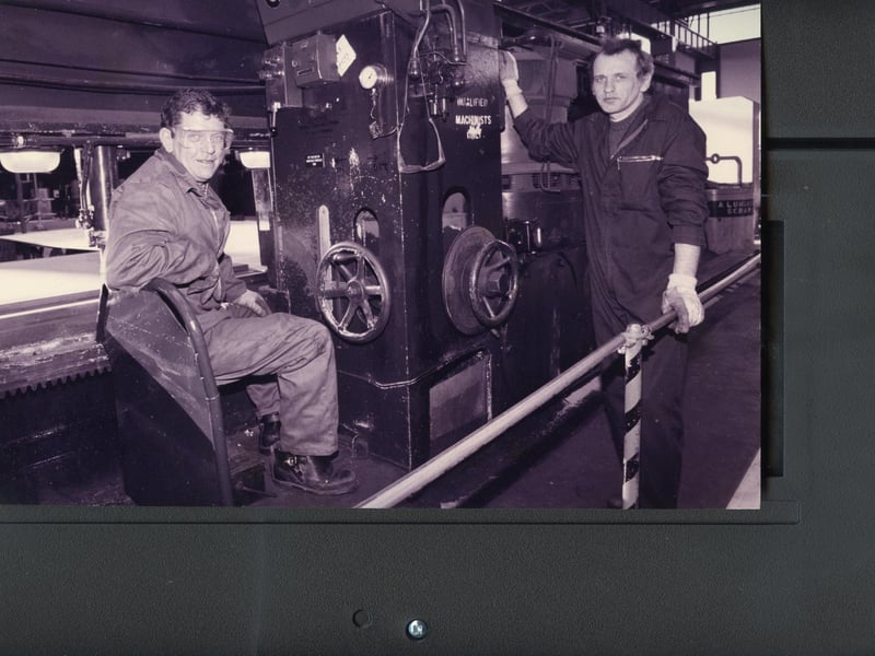 Ship plate machinists Alec Hosie and Bill Dack, who operate the huge edge planing machine in the heavy plate shop, Portsmouth Naval Base, 1992. The News PP5002