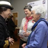 Annette Picton, pictured centre, with her mother Joan as the pair met Princess Anne during an event to mark the 100th anniversary of the formation of the Women's Royal Naval Service