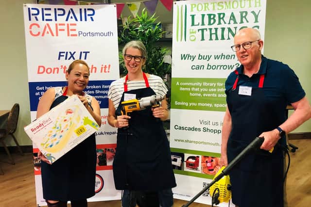 Clare Seek (centre) at the Cascades hub with volunteers.