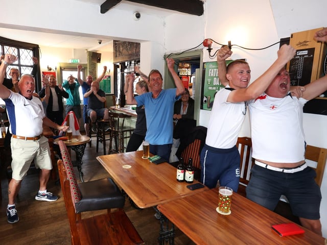 Fans in The Milton Arms Pub celebrate in disbelief as England scrape through to the quarter finals after extra time.Picture: Sam Stephenson.