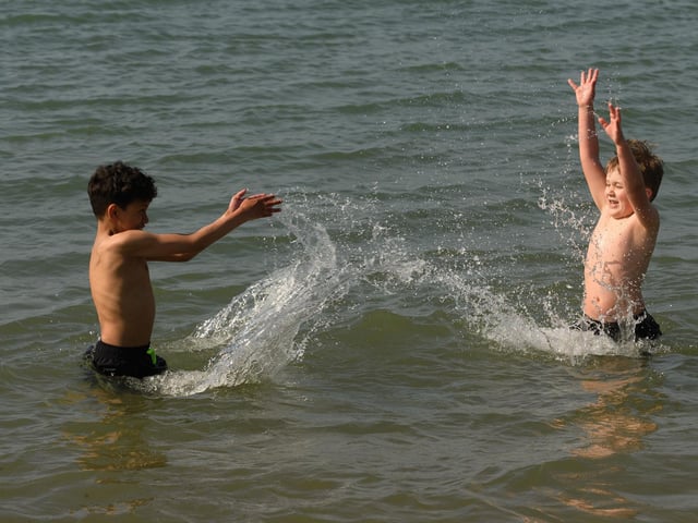 Devaun Keir and Kian Jones enjoy themselves in the sea. (160421-31)