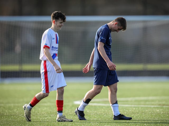 Faces of victory and defeat in a single image. Picture: Chris Moorhouse