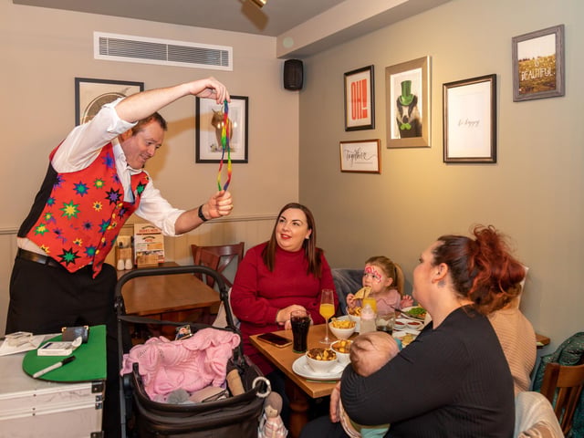 Magician Roy 'Magic Charlie' Charles provides entertainment during the opening of the Brewers Fayre. Picture: Mike Cooter (040323)