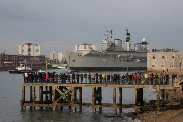 HMS Illustrious is towed from her home port at Portsmouth Docks after being sold for scrap on December 7, 2016 in Portsmouth. Photo by Matt Cardy/Getty Images