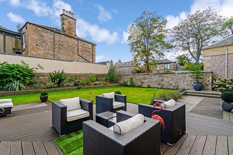Decking area and lawn.