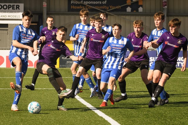 Action from the Portsmouth Youth League U15 Challenge Cup final between Bedhampton Youth (blue and white kit) and Gosport Falcons. Picture: Keith Woodland (190321-316)