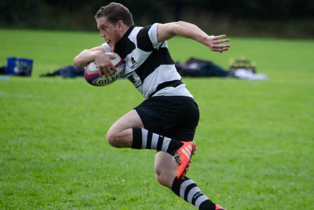 Richard Brember playing rugby. Picture: Julian Frost, Farnham Rugby Club