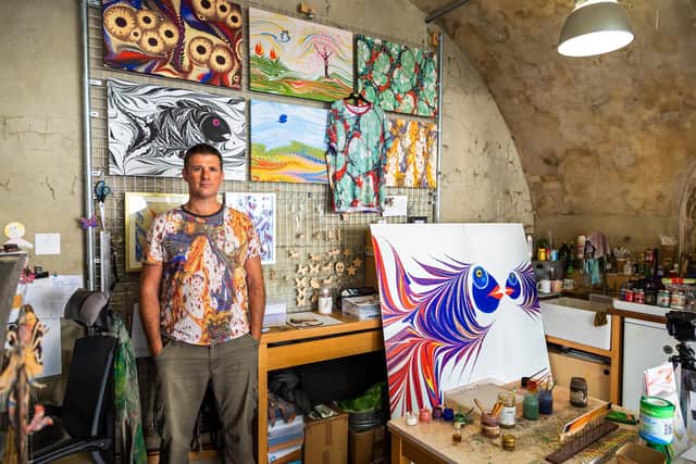 James Mouland (46) inside Hotwalls Studio 13, with some of his huge range of art pieces. Picture: Mike Cooter (060821)